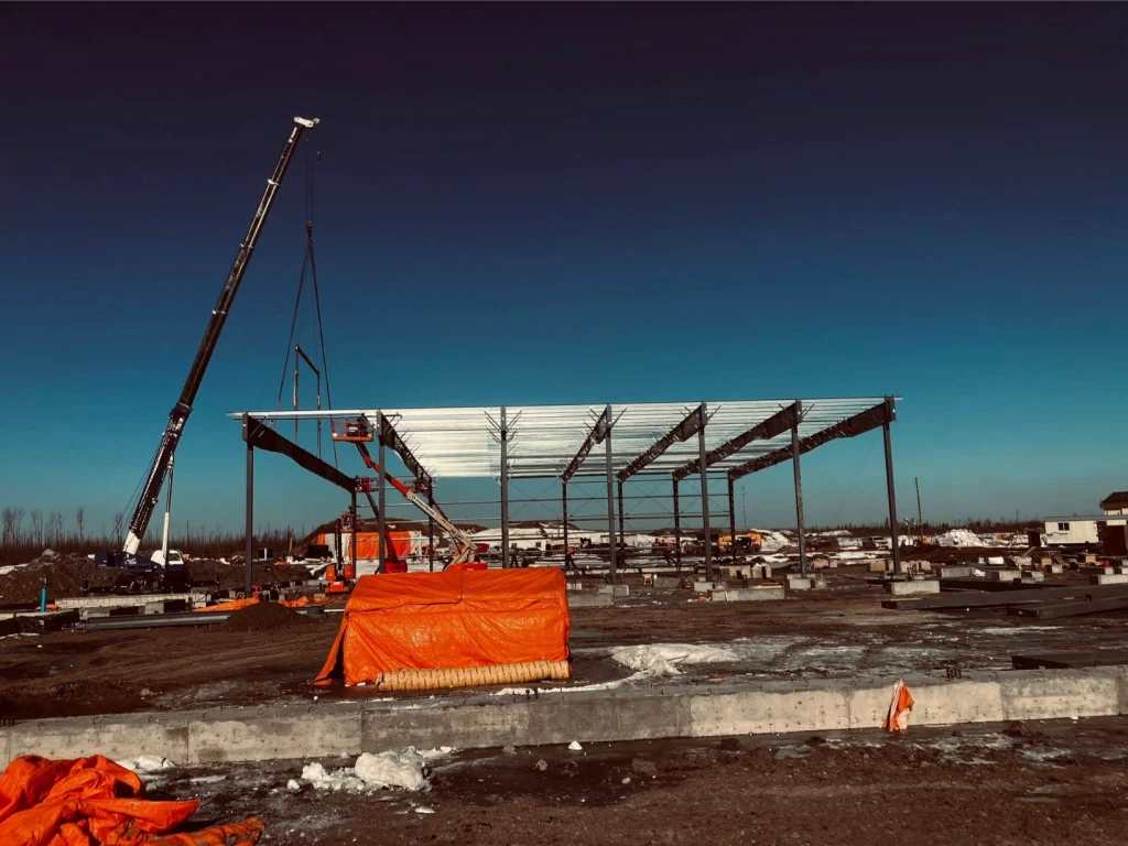 Construction locations showcase a partially built structure with cranes and bright orange tarps